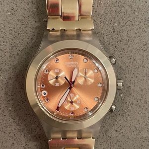 Swatch Irony unisex Carmel rose gold watch.